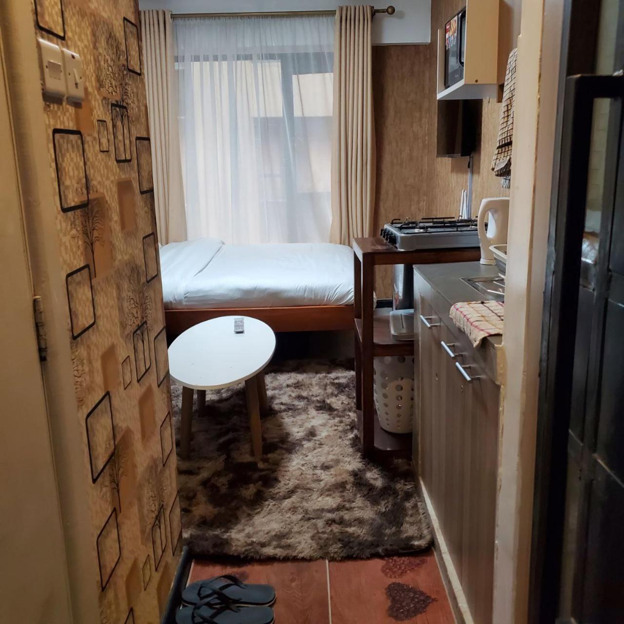 Appartement Lovely & Cozy Compact Studio Near Airport With Rooftop View à Nairobi Extérieur photo