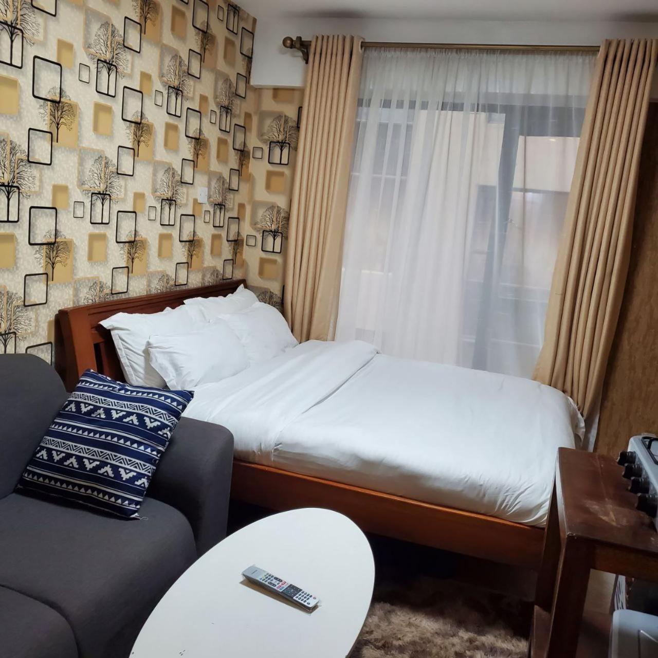 Appartement Lovely & Cozy Compact Studio Near Airport With Rooftop View à Nairobi Extérieur photo