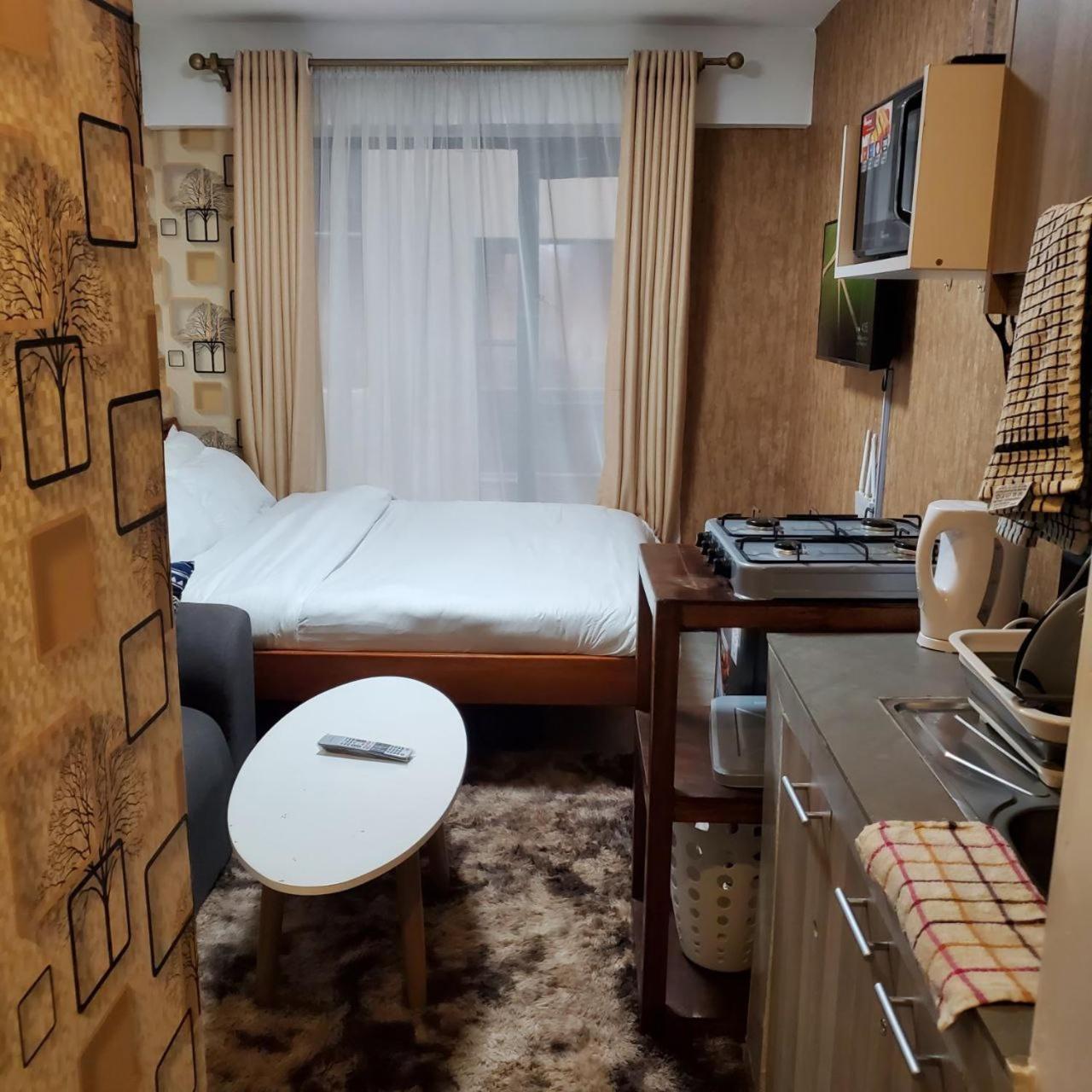 Appartement Lovely & Cozy Compact Studio Near Airport With Rooftop View à Nairobi Extérieur photo