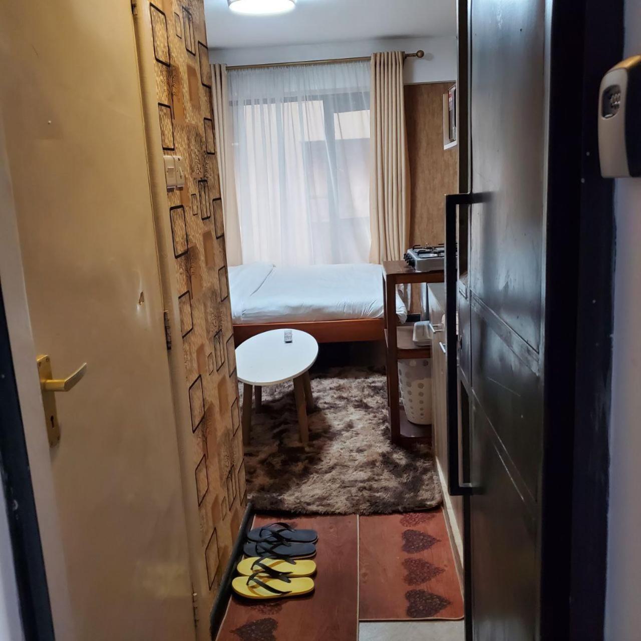 Appartement Lovely & Cozy Compact Studio Near Airport With Rooftop View à Nairobi Extérieur photo